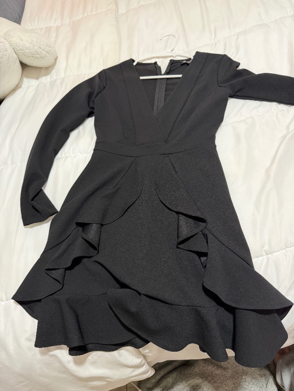 Fashion Nova Delicacy Ruffle Dress is a black, long-sleeve mini dress